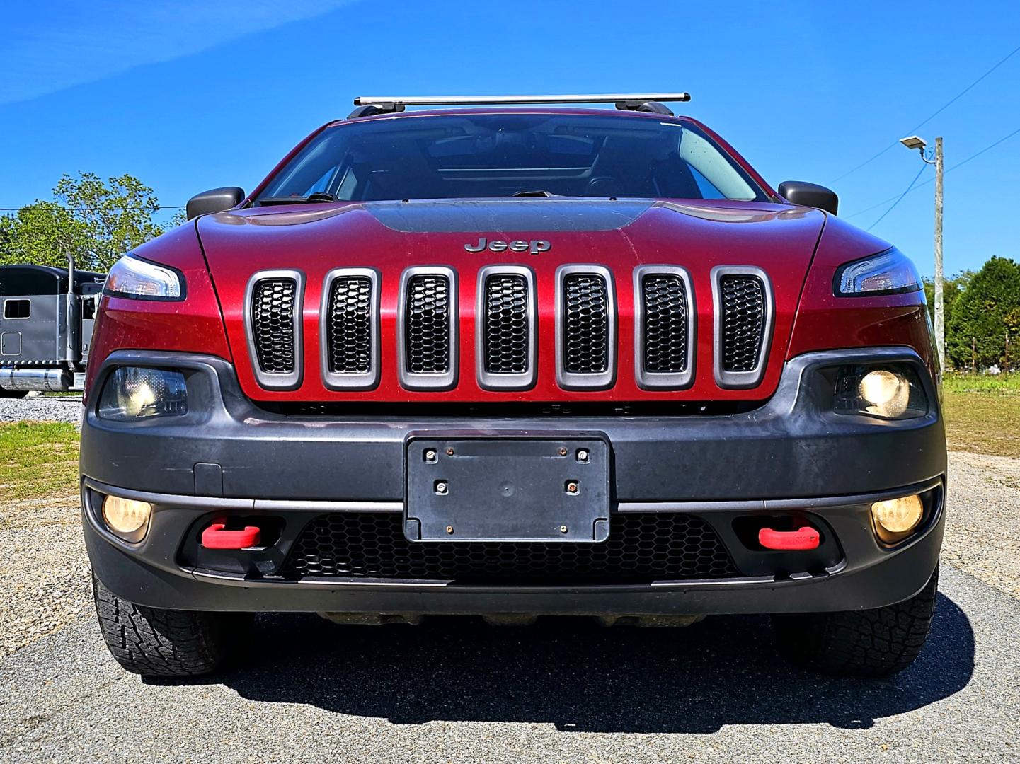 2014 Red Jeep Cherokee Trailhawk 4WD (1C4PJMBS2EW) with an 3.2L V6 DOHC 24V engine, 9-Speed Automatic transmission, located at 18001 Kellogg Rd, Saucier, MS, 39574, (228) 832-1441, 39.421459, -76.641457 - Photo#29